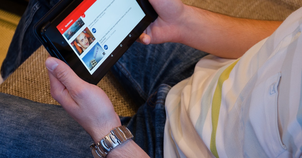 Man holding tablet