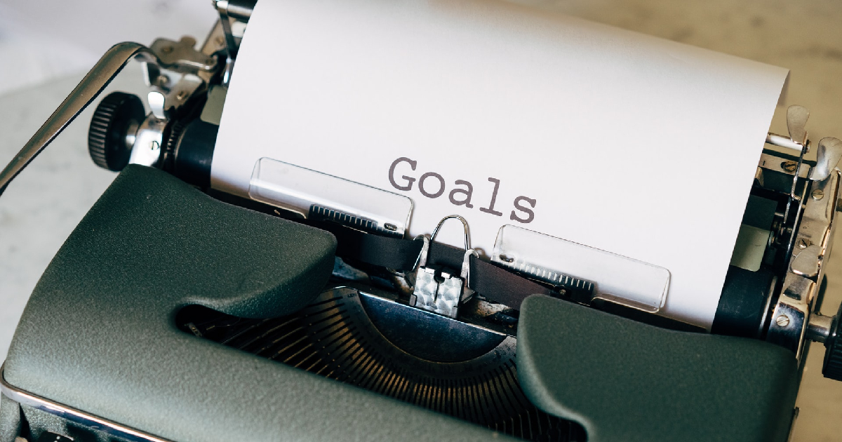 Goals written on typewriter