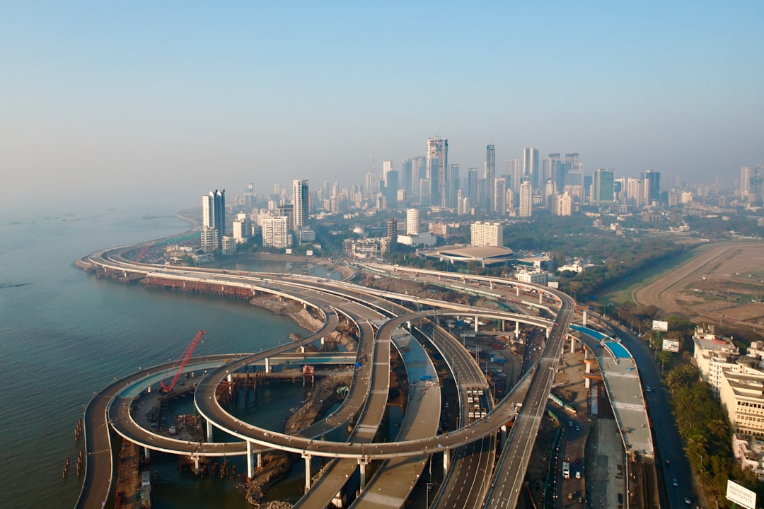an aerial view of a highway and a city highway bridge city infrastructure