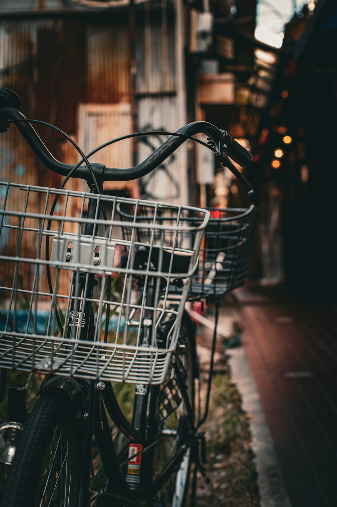 a bicycle parked on the side of a road group shopping cart grocery app