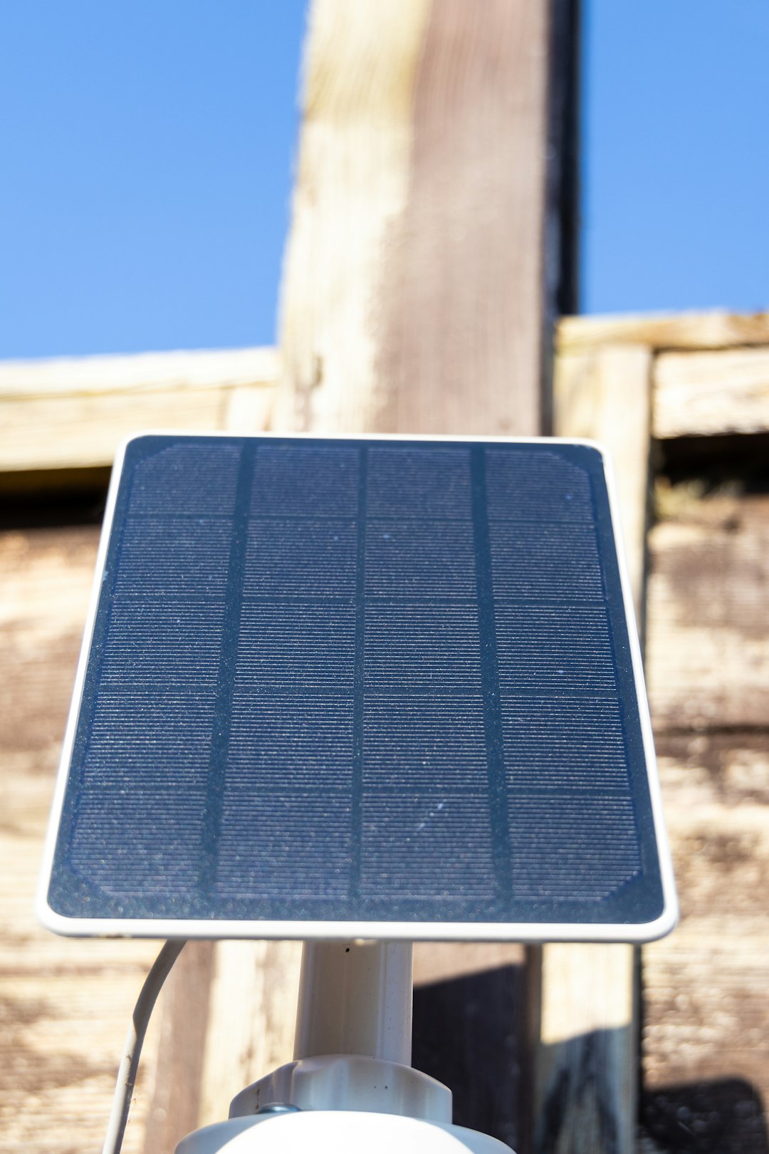 A close up of a street sign with a sky background smart grid, solar panels, ev charging, sustainable energy